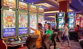 Filipino players enjoying online slot games on mobile devices at home in the Philippines